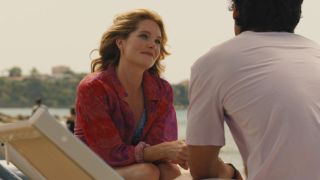 Daphne (Meghan Fahy) on the beach in Sicily