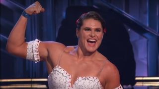 Ilona flexes for the crowd following her performance.